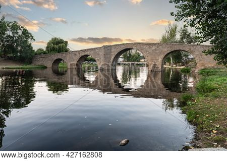 The So-called Old Bridge Or Romanesque Bridge Crosses The Alberche River As It Passes Through The Sp