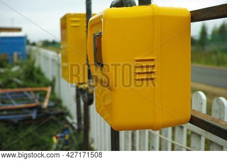 Lpg  Pipeline And Meter In A Yellow Metal Box, Outdoor Shot