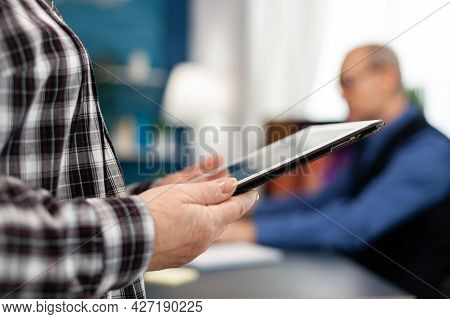 Senior Woman Holding Tablet Pc Standing Up. Close Up Of Elderly Woman Using Moder Technoloy Tablet P