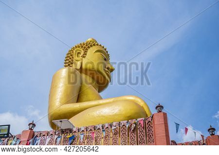 Golden Big Buddha On Phu Chang Noi  At Chiang Khan Loei Thailad.chiang Khan Is An Old Town And A Ver