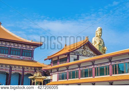 Guanyin Goddress With Temple Rooftop And Beautiful Sky At Foguangshan Thaihua Temple Thailand.fo Gua