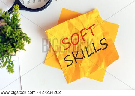 Text Soft Skills On Crumpled Yellow Paper, Concept