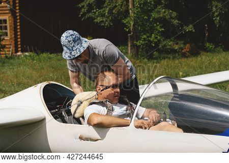 Soaring Club, Getting Ready For The Flight On Glider Airplane. Small Aviation Sport. Two Man Checkin