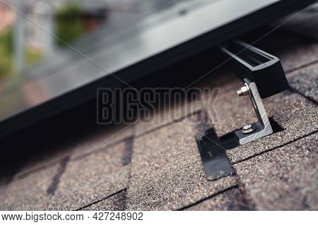 Rail, Bracket, And Anchor To A Solar Panel Installed On A Asphalt Shingle Roof