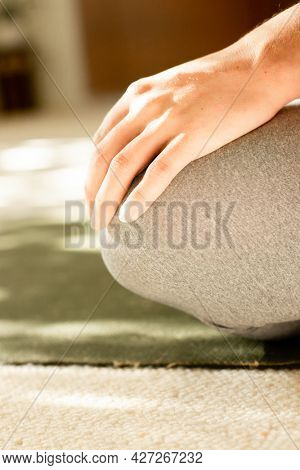 young pregnant woman practicing maternity yoga