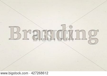 Branding word in debossed text style