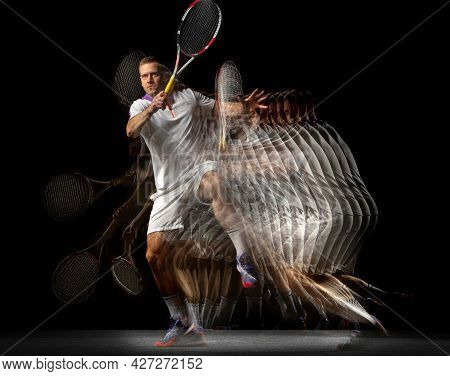 Power And Speed. Young Man, Professional Tennis Player In Motion And Action Isolated On Dark Backgro