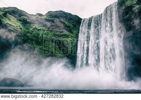 Scogafoss Waterfall In Iceland. Travel Summer Nordic Concept. Natural Icelandic Background.