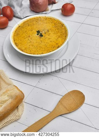 Peruvian Food, Traditional Soup A La Minuta In White Bowls, Top View.