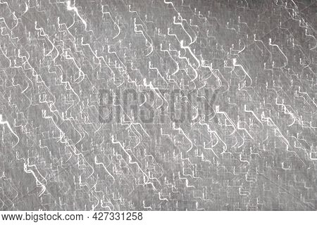 Abstract Background With Glowing Particles And Lines. Gray Background Beautiful Curves Convolutions.