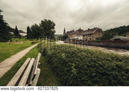 River Ourthe Meanders Through The Center Of Houffalize In The Belgian Ardennes On A Cloudy Day After
