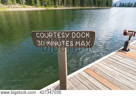 Sign For A Courtest Dock, 30 Minutes Max, For Use Of Boaters And Fishermen. Taken At Colter Bay Mari