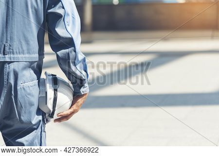 Engineer Man Hands Holding Hardhat White Work Helmet Hard Hat For Construction Engineering. Construc