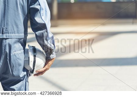Engineer Man Hands Holding Hardhat White Work Helmet Hard Hat For Construction Engineering. Construc