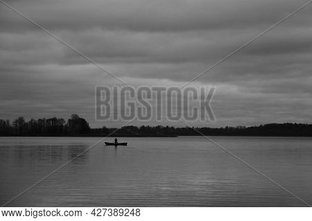 Blurry Background, Black And White Photo On The Shore Of The Lake In Autumn