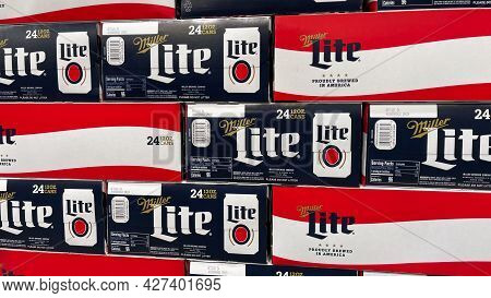 Cases Of Cans Of Miller Lite Beer At A Grocery Store Waiting For Customers To Purchase.