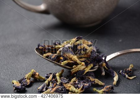 Dry Butterfly Pea Flower Tea In A Spoon. Asian Tea