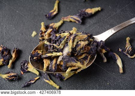 Dry Butterfly Pea Flower Tea In A Spoon. Asian Tea