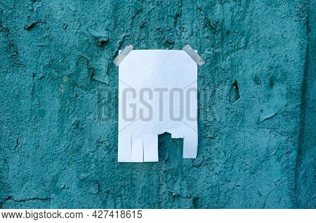 Tear off paper on paint wall. Mock up template. Street paper ad or announcement with tear-off stripes with phone number. Blank design. Copyspace mockup