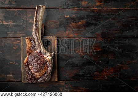Steak On The Bone. Tomahawk Steak Freshly Grilled Dry Aged Bbq Food Set, On Wooden Serving Board, On
