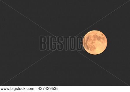 Beautiful Moon On Black Background With Place To Write Text In White Letters About Moon And Astronom