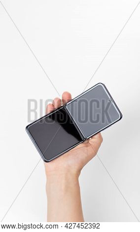 Rostov-on-don, Russia - June 2020. Samsung Galaxy Z Flip On A White Background. New Smartphone With 