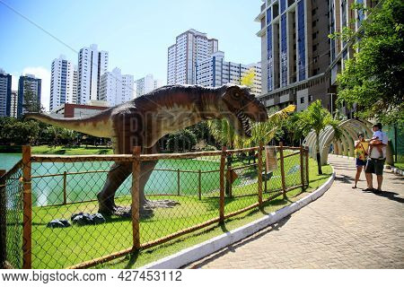 Dinosaur Sculpture In Park
