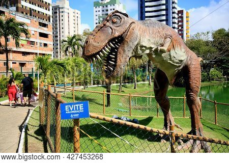 Dinosaur Sculpture In Park