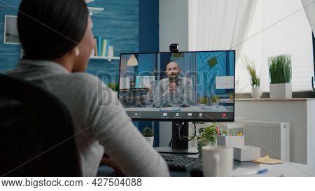 Closeup Of Student Talking With Entrepreneur Discussing Marketing Ideas Having Videocall Meeting Con