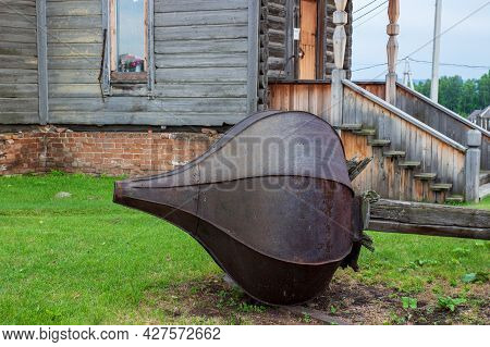 Rusty Metal Onion Dome Without A Cross From The Church Of Paraskeva Pyatnitsa Lies On The Ground. Vi