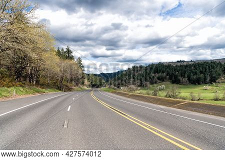Oregon Empty Road. Summer Route. Travel Way With Landscape. Highway Road Among Forest. Roadway