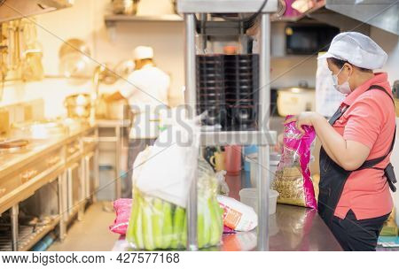 Bangkok Thailand: Jun 04 2021: Chef And Assistant Prepare Material Food For Cooking And Serve In The