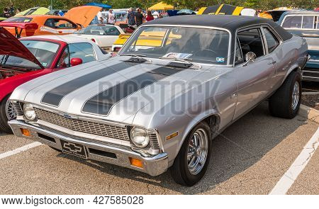 Homestead, Pennsylvania, Usa July 21, 2021 A Vintage Two Toned Silver With Black Stripes Chevrolet N