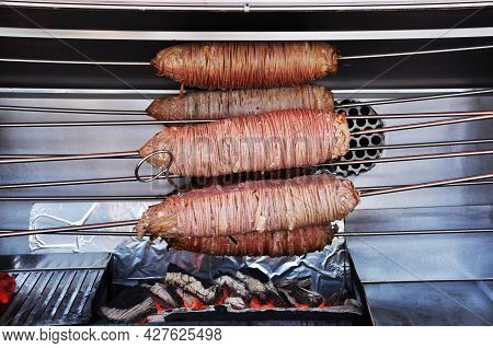 Fast Food. Kokorech Is Cooked On Skewers On Burning Coals. Turkish Cuisine Fast Food Dish.
