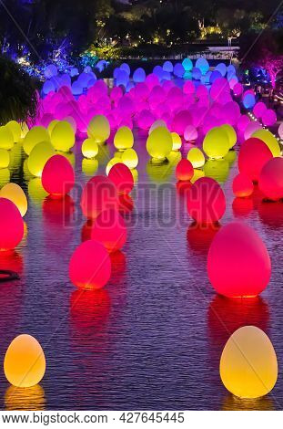 Singapore - Feb 25, 2020. Neon Eggs Float On Water In Dragonfly Lake, Gardens By The Bay. Temporary 