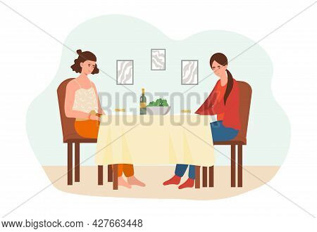 Healthy Food Concept. Two Women Are Sitting At A Table And Eating Healthy Vegetables. Full Fledged F