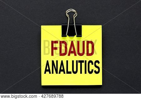 Fraud Analytics. Text On A Black Background, On A Bright Yellow Sticker