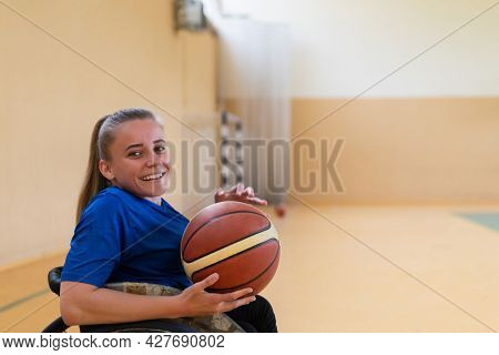 photo of the basketball team of war invalids with professional sports equipment for people with disabilities on the basketball court