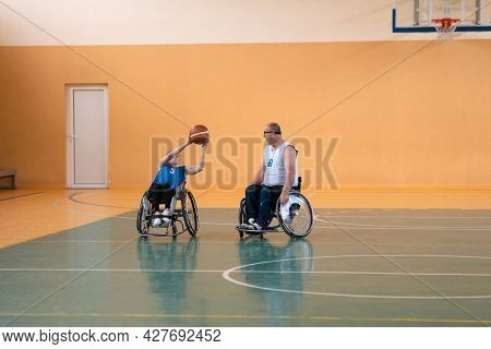 a young woman playing wheelchair basketball in a professional team. Gender equality, the concept of sports with disabilities. 