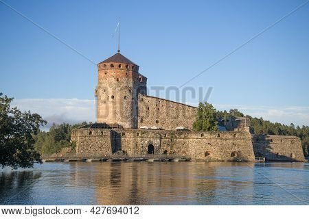 View Of The Old Swedish Fortress Olavinlinna (olafsborg) On An August Evening. Savonlinna, Finland