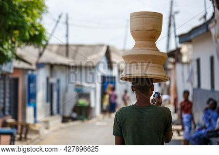 Genaral Scene Of African Woman Wiht Things On Head