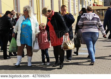 May 2, 2015. Minsk, Belarus. Fat People On The Street Of The City.