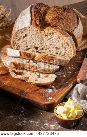 Freshly Artisan Baked Wheat And Rye Bread, Country Bread. Simple Bread  With Butter For Breackfast