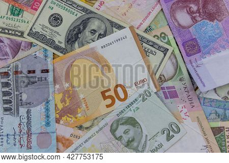Multicurrency Background Of Us Dollars, Euros, Turkish Liras, Egyptian Pounds And Ukrainian Hryvnias