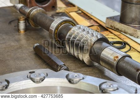 Worm Shaft And Worm Wheel In A Locksmith's Workshop On The Assembly Of The Gearbox.