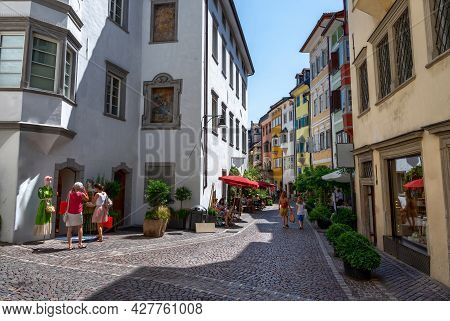 Bolzano, Italy, June 2021. A Secondary Street In The Historic Center. People On The Street, Bright, 
