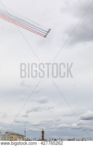 July 22, 2021, Russia, St. Petersburg. Military Aircraft Painted The Sky Over The Neva In The Colors