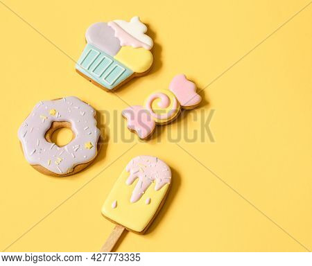 Beautiful Gingerbread Cookies For A Children's Party In The Form Of Sweets, Flat Lay.