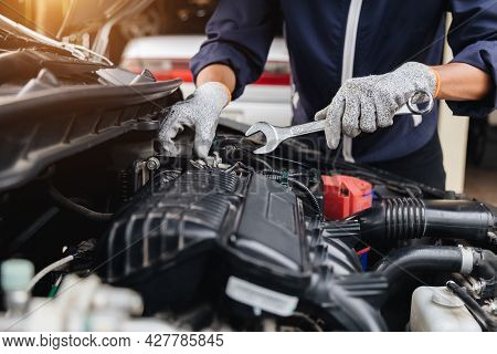 Automobile Mechanic Repairman Hands Repairing A Car Engine Automotive Workshop With A Wrench, Car Se