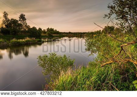Sunset Over Warta River In Warta Landscape Park, Lad, Poland.
